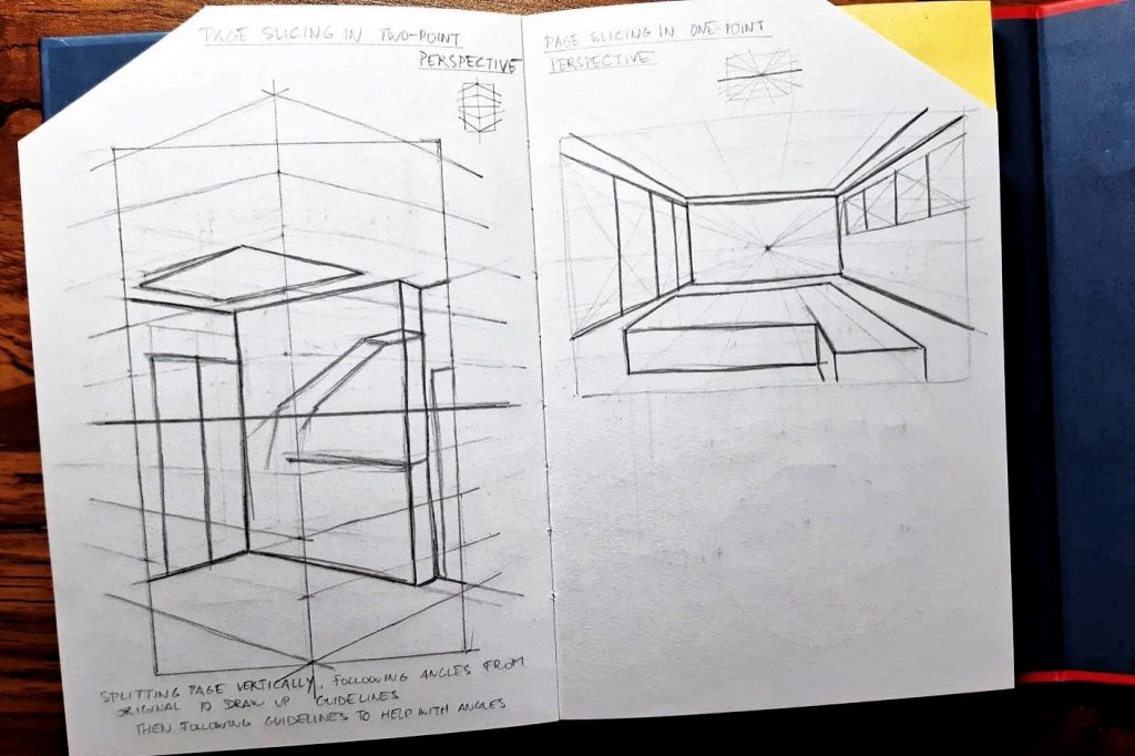 open notebook showing sketches of two rooms